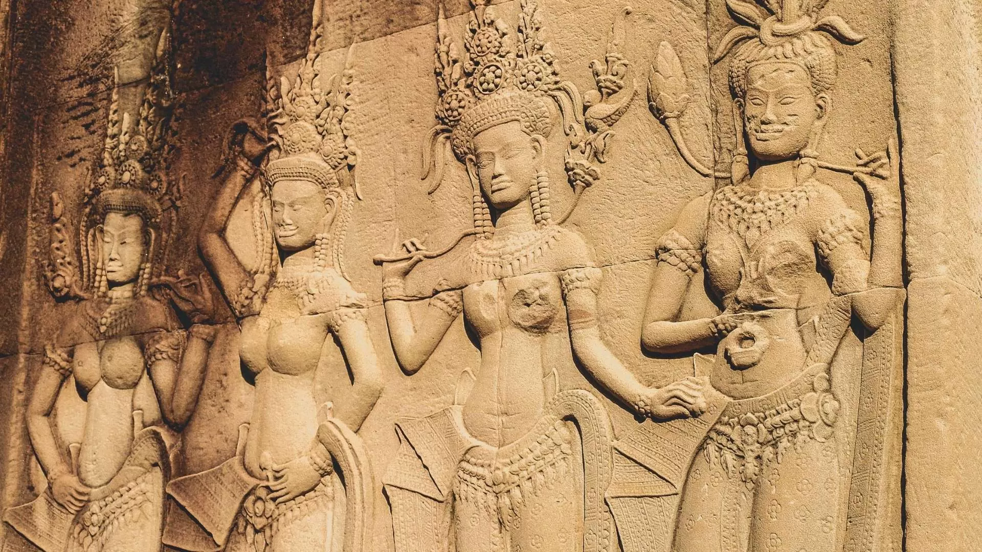 Intricate stone carvings showcasing ancient Khmer artistry.