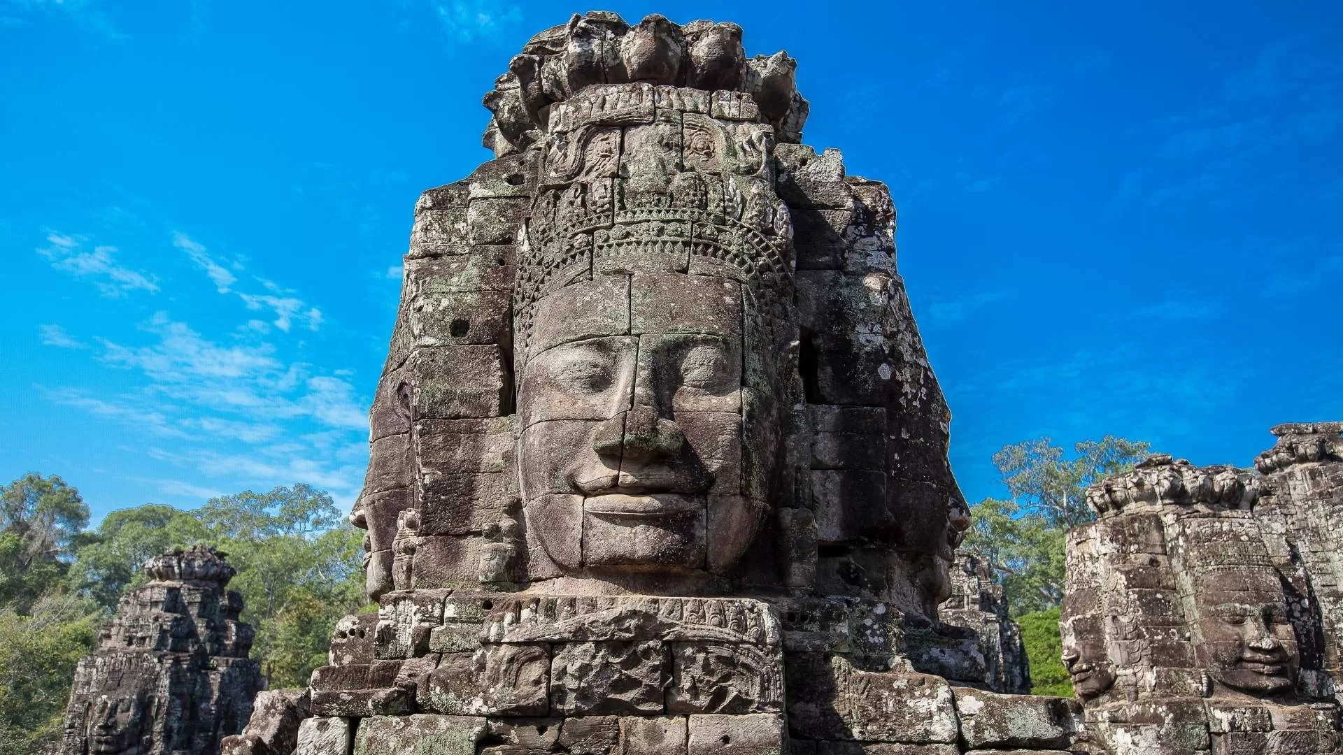 Carved stone giant faces at Bayon Temple