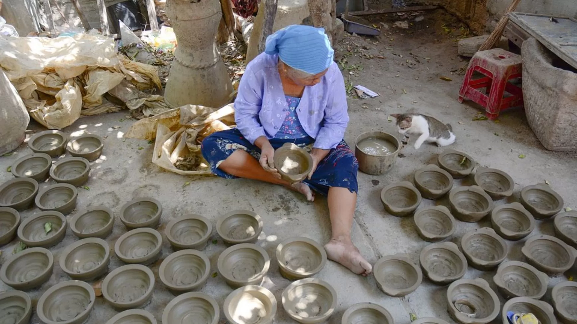 Skilled artisan making pots