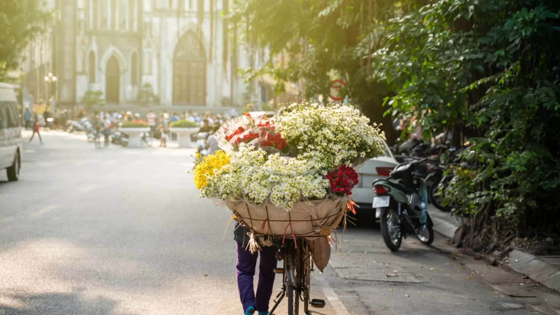 Flower vendors along St. Joseph’s Cathedral, capturing the season’s charm.
